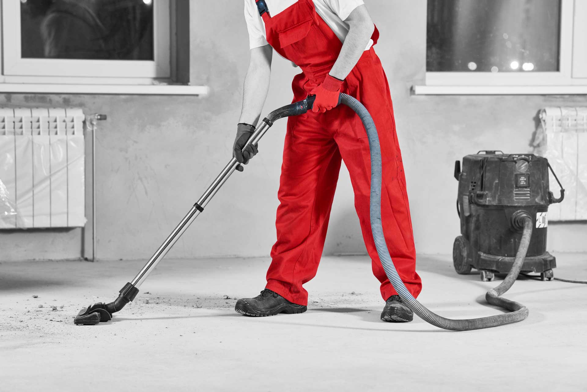 An Image of Poppies Cleaner Vacuuming the Floor